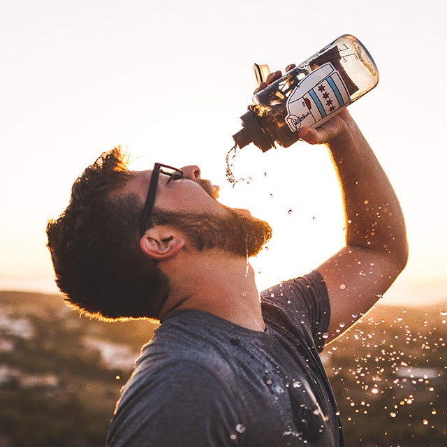 Man Drinking Water to Get Weed out of System